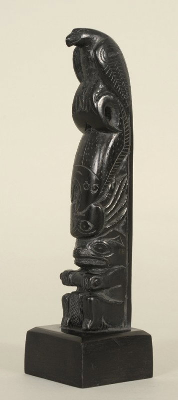 Moses Ingram Argillite Totem Carved with Raven, Ha: Moses Ingram Argillite Totem Carved with Raven, Halibut, Crab and Beaver 7 3/4" H. 2" W. Good Condition