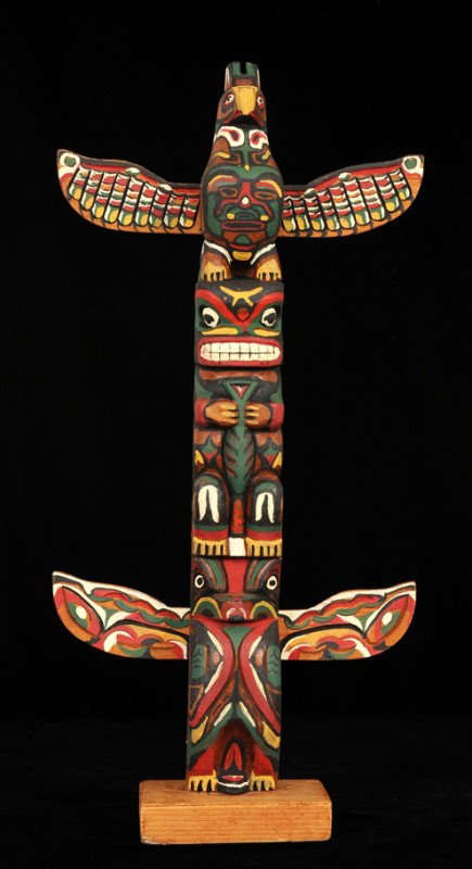 Cowichan Totem Carved with Thunderbird, Bear Holdi: Cowichan Totem Carved with Thunderbird, Bear Holding Salmon and an Owl Signed Simon C. Dated 1946 23" H. 11 1/2" W. Good Condition