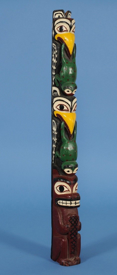 Northwest Coast Totem Carved with Two Ravens Holdin: Northwest Coast Totem Carved with Two Ravens Holding a Frog and Beaver by Derek Slack 21" H. Good Condition