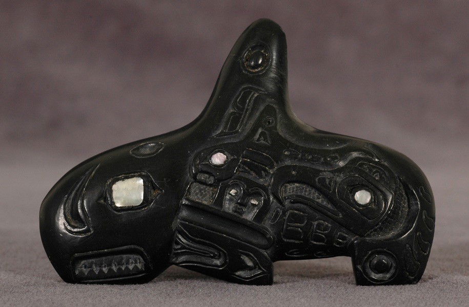 Haida Shaman's Amulet ca. 1900 - Carved Argillite D: Haida Shaman's Amulet ca. 1900 - Carved Argillite Depicting a Killer Whale with Abalone Inlay 3 3/8" L. 2 3/8" H. Good Condition