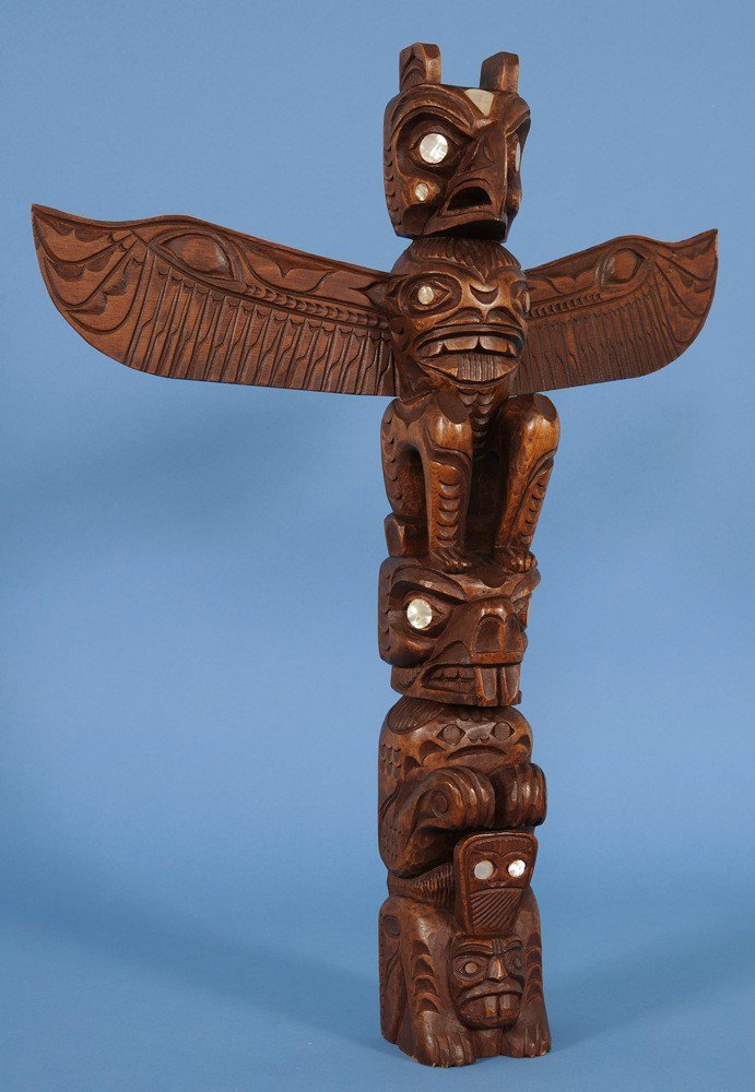 Nuu-chah-nulth Totem Carved with Thunderbird, Beav: Nuu-chah-nulth Totem Carved with Thunderbird, Beaver and Pugwus Attributed To Jimmy John 25 1/2" H. 20 3/4" W. Good Condition