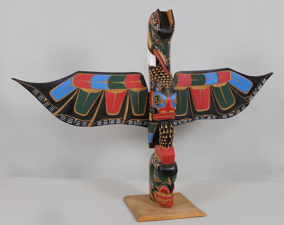 Kwakwaka'wakw Totem Carved Raven and Chief, Made i: Kwakwaka'wakw Totem Carved Raven and Chief, Made in Alert Bay, B.C. 34" H. 48" W. Fine Condition