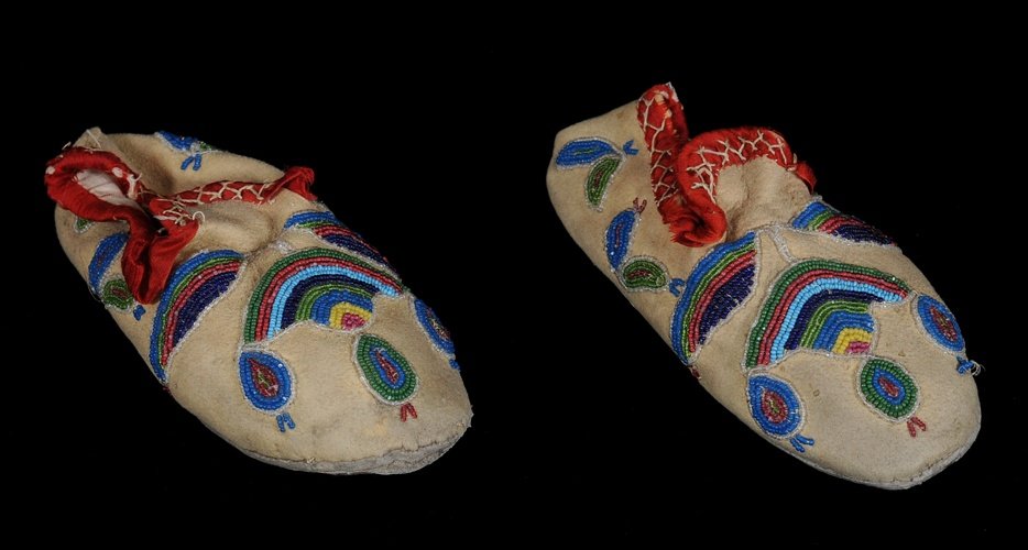Pair of Santee Sioux Beaded Child's Moccasins, Slipp: Pair of Santee Sioux Beaded Child's Moccasins, Slipper Style with Rainbow Design ca. 1890 6" L. Good Condition