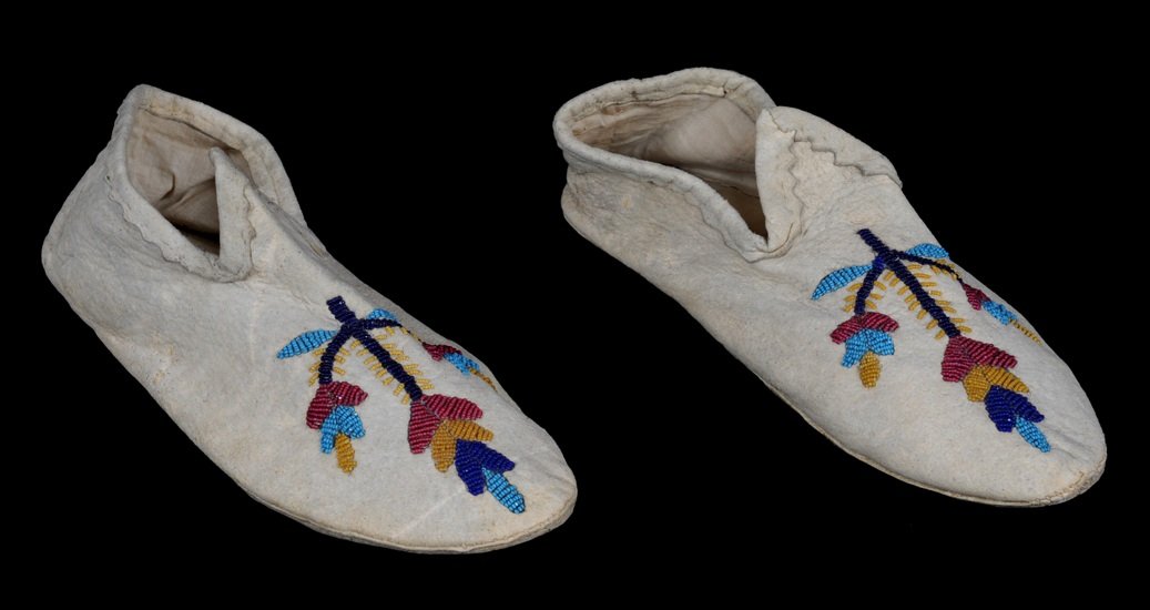 Pair of Santee Sioux Woman's Beaded Moccasins with : Pair of Santee Sioux Woman's Beaded Moccasins with Floral Design ca. 1890-1900 9 1/4" L. Fine Condition