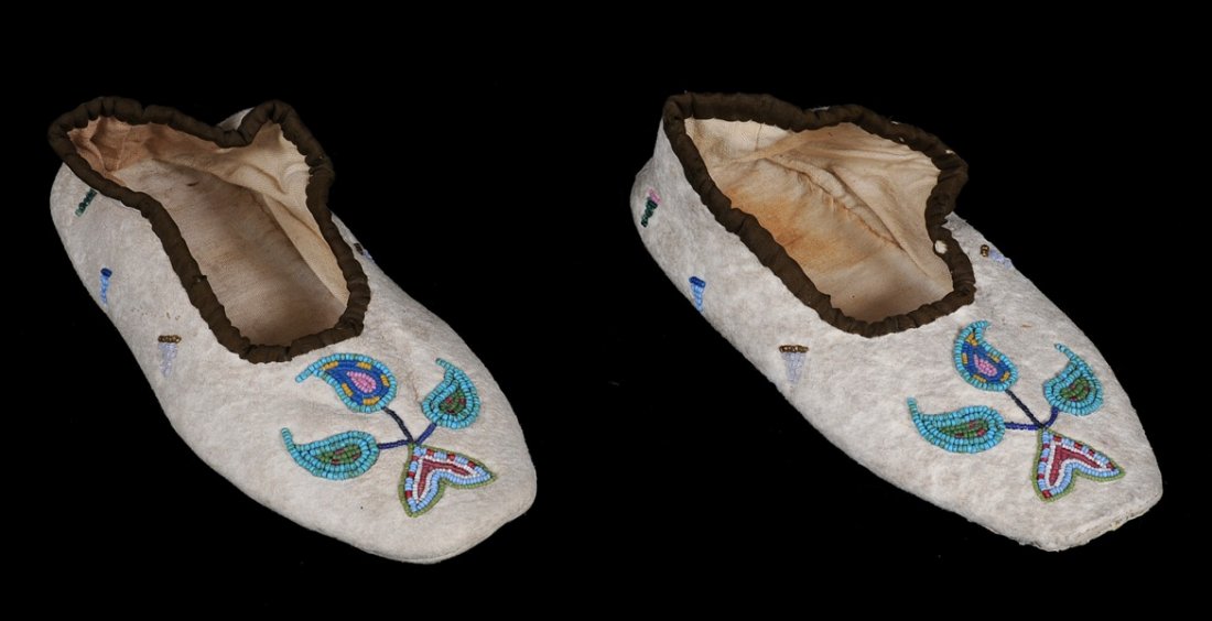 Pair of River Crow Beaded Child's Moccasins with F: Pair of River Crow Beaded Child's Moccasins with Floral Design ca. 1890 - 1900 7" L. Good Condition
