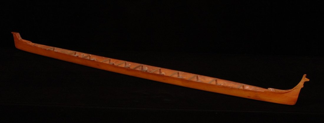 Salish Model Racing Canoe 53" L. 3 1/8" W. Good C: Salish Model Racing Canoe 53" L. 3 1/8" W. Good Condition with Repair to Prow