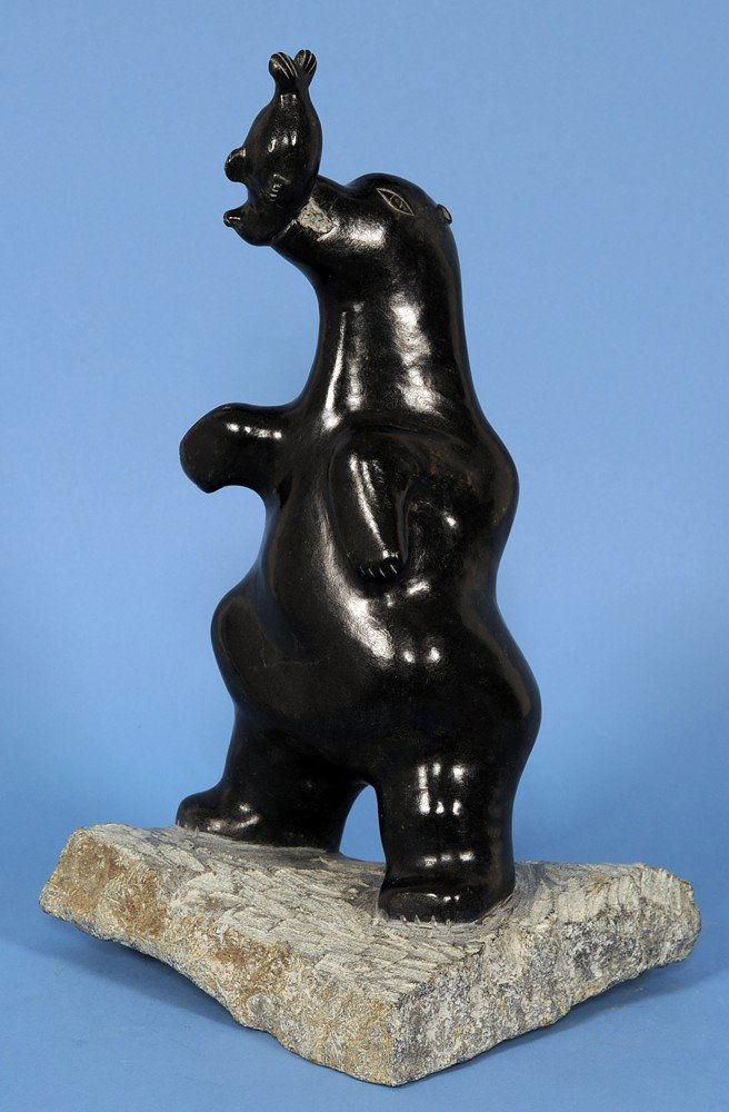 Sculpture of a Bear Holding a Seal by George Arloo: Sculpture of a Bear Holding a Seal by George Arlook (Arlu) 1981 - Arviat 16" H. 12 1/2" W. Good Condition