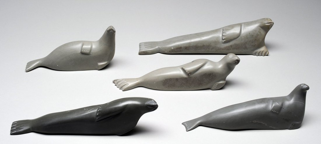 Five Seal Carvings; Two by Rhoda Sala 10 1/2" L. a: Five Seal Carvings; Two by Rhoda Sala 10 1/2" L. and 9" L., Maggie Sala 9" L. 2 3/4" H., Sarah Kittosuk Jr 6 1/2" L. 4" H. and Simeonie Kavik 7 1/2" L. 2 3/4" H. - Sanikikuaq, Good Condition