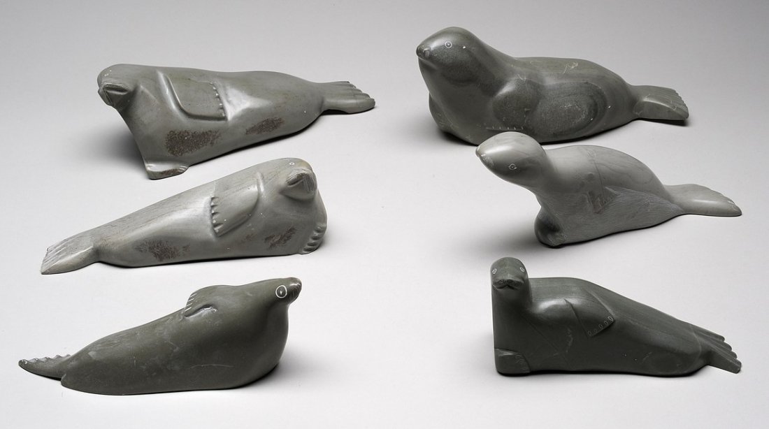 Six Seal Carvings by Various Sanikiluaq Artists In: Six Seal Carvings by Various Sanikiluaq Artists Including Rhoda Sala and Caroline 7" L. - 11" L. All in Good Condition