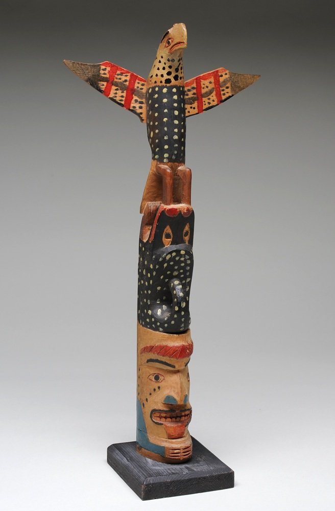 Northwest Coast Totem Carved with Thunderbird, Wol: Northwest Coast Totem Carved with Thunderbird, Wolf and Shaman 16" H. 7 1/2" W. Good Condition