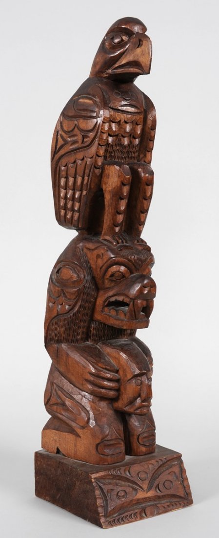 Jimmy John Totem Carved with Eagle and Bear Holdin: Jimmy John Totem Carved with Eagle and Bear Holding Shaman Spirit 26 1/2" H. 6" W. Base Good Condition with One Minor Chip Arm of Bear