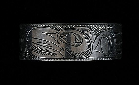 19TH C. Tlingit Silver Napkin Ring with Incised Thunder: 19TH C. Tlingit Silver Napkin Ring with Incised Thunderbird Design 1 3/4" D. 5/8" H. Fine Condition