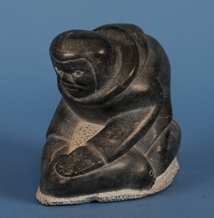 Inuit Hunter and Seal Soapstone Sculpture Signed in Syl: Inuit Hunter and Seal Soapstone Sculpture Signed in Syllabic and Dated 1975 E-25007 7" L. 6" W. Good Condition