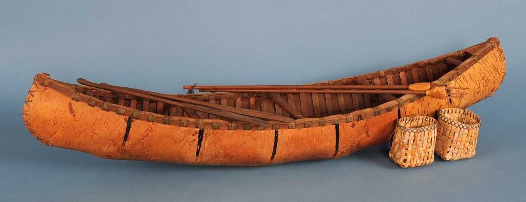 Large Birch Bark Model Canoe with Baskets, Paddles and: Large Birch Bark Model Canoe with Baskets, Paddles and Two Fishing Spears 33 1/4" L. 8 3/4" W. All in Good Condition