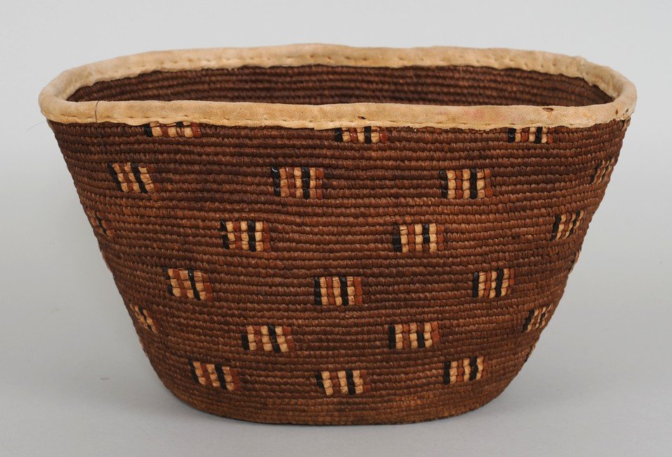 Thompson River Burden Basket ca. 1890 with Imbricated: Thompson River Burden Basket ca. 1890 with Imbricated Design and Deerskin Rim 14" L. 11 1/2" W. 8" H. Good Condition
