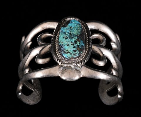 Navajo Sand Cast Silver and Carico Lake Turquoise: Navajo Sand Cast Silver and Carico Lake Turquoise Bracelet 130 GMS 6 1/4" L. 2 1/4" W. 1 5/8" W. Gap Fine Condition