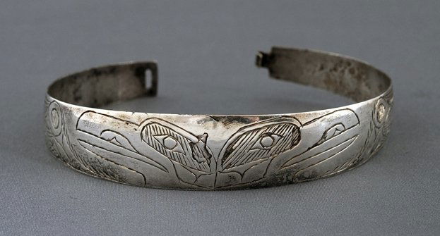 19TH C. Tlingit Coin Silver Bracelet with Double Raven: 19TH C. Tlingit Coin Silver Bracelet with Double Raven Design 7 1/4" L. 1/2" W. Good Condition