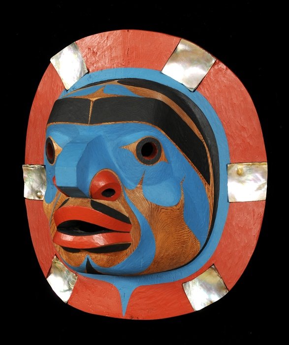 Gene Brabant Bella Coola Moon Mask with Abalone Inlays: Gene Brabant Bella Coola Moon Mask with Abalone Inlays Carved From One Piece of Wood 1982 17" H. 15 1/2" W. Good Condition