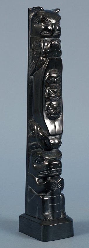 Haida Argillite Totem Carved with Seven Figures by Tom: Haida Argillite Totem Carved with Seven Figures by Tom Hans 12 1/2" H. 2 1/4" W. Good Condition