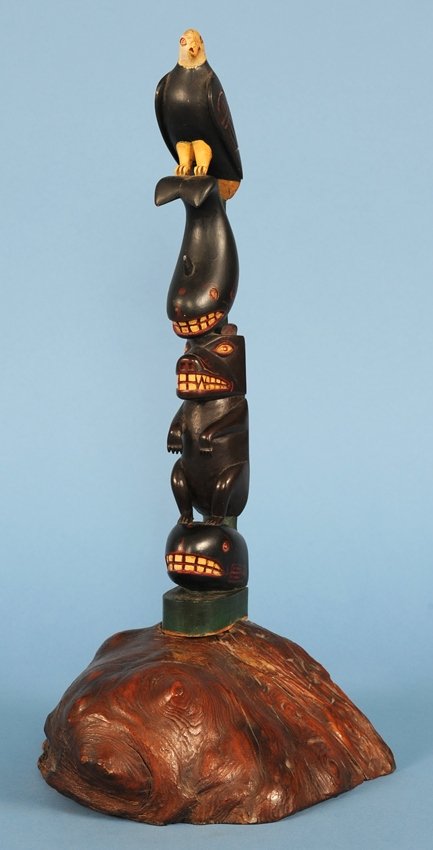 Northwest Coast Totem Carved with Four Figures on a: Northwest Coast Totem Carved with Four Figures on a Burl Base 17 1/4" H. Good Condition