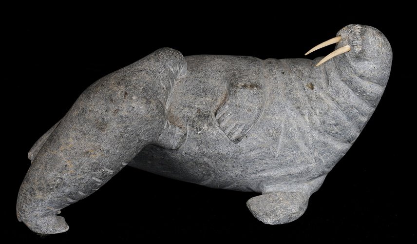 Inuit Mother and Baby Walrus Carved by Joanasi Naluiyuk: Inuit Mother and Baby Walrus Carved by Joanasi Naluiyuk (B. 1917 - ) Community of Salluit E9-1155 9" L. 4 3/8" H. (First Generation Artist) Good Condition