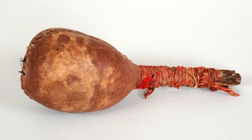 Plains Rawhide Rattle with Trade Cloth ca. 1900 9" H.: Plains Rawhide Rattle with Trade Cloth ca. 1900 9" H. As Is