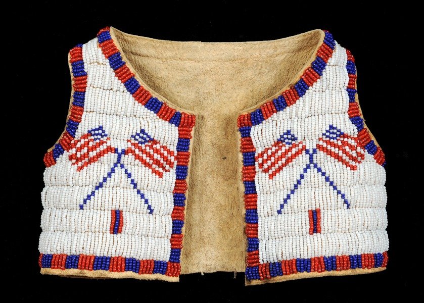 Cheyenne Beaded Sinew Sewn Infant's Vest with American: Cheyenne Beaded Sinew Sewn Infant's Vest with American Flag and Geometric Design ca. 1950's