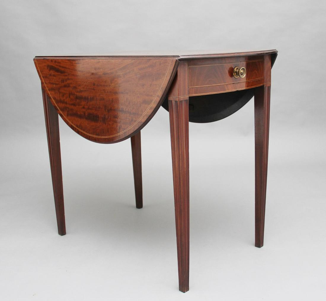 Early 19th Century mahogany Pembroke table:  Early 19th Century mahogany Pembroke table, the lovely figured drop leaf top with a moulded edge and inlay decoration, a single mahogany lined drawer at one end with a turned brass handle, the d