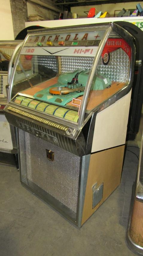 Rockola Model 1458 Jukebox 120 Select: Rockola Model 1458 Jukebox 120 Select. Dimensions: 55 x 31 x 27.5