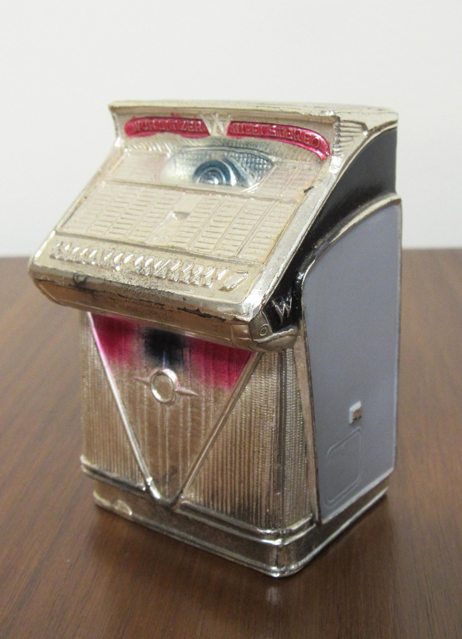 Wurlitzer Model 2400 Jukebox Coin Bank: Wurlitzer Model 2400 Jukebox Coin Bank, distributor promotional item. Dimensions: 3.25 x 2 x 2