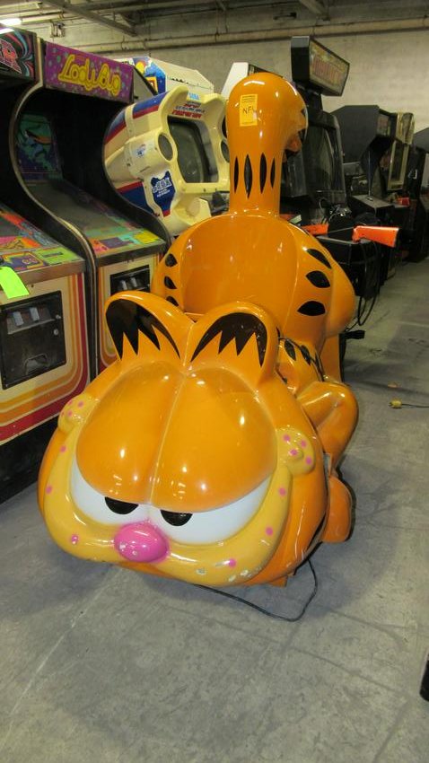 Garfield the Cat Coin Operated Kiddie Ride: Garfield the Cat Coin Operated Kiddie Ride working, licensed ride. Dimensions: 63 x 40 x 62