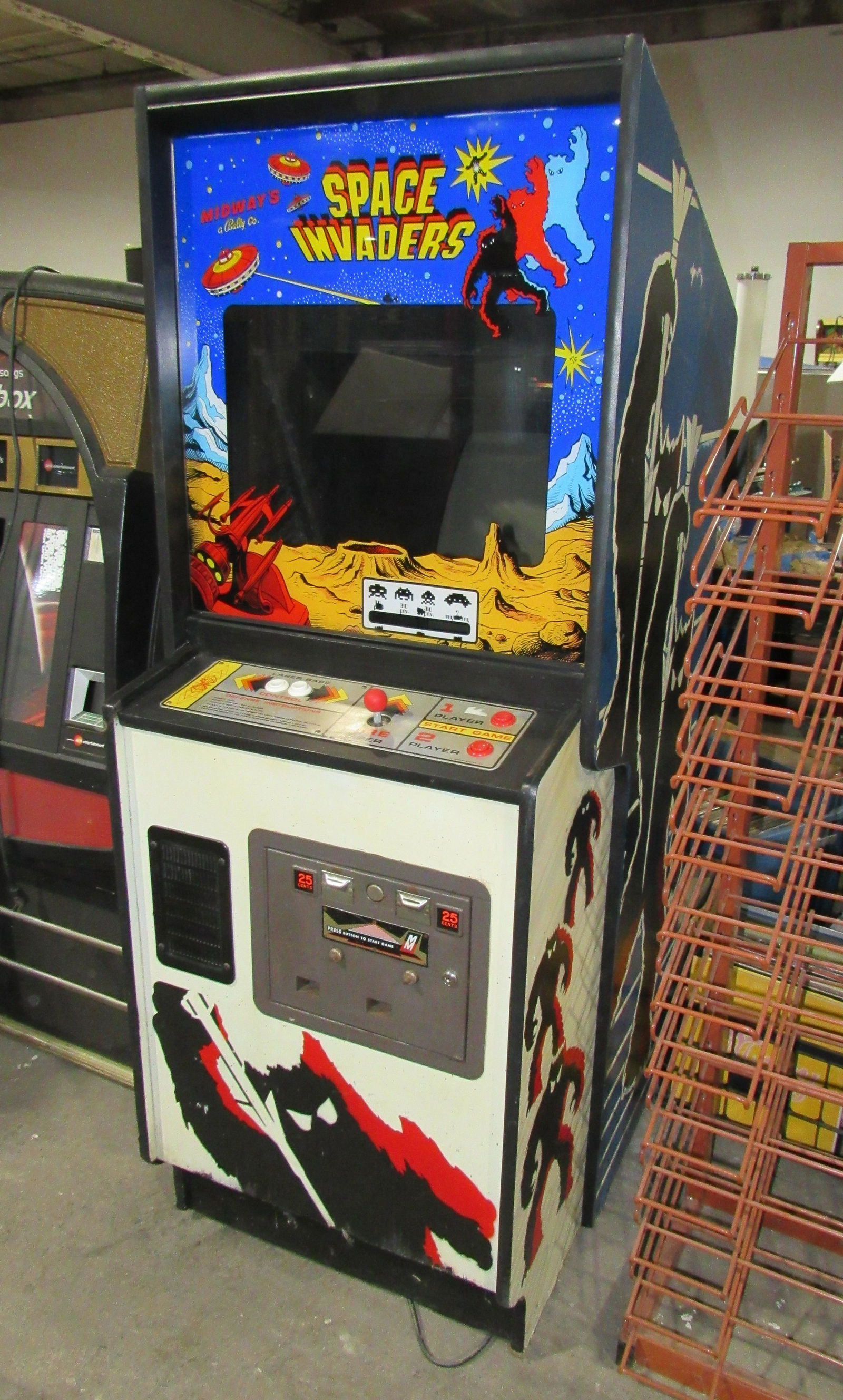 Space Invaders Multicade Arcade Game: Space Invaders Multicade Arcade Game. Monitor needs repair. Dimensions: 69 x 26.5 x 35