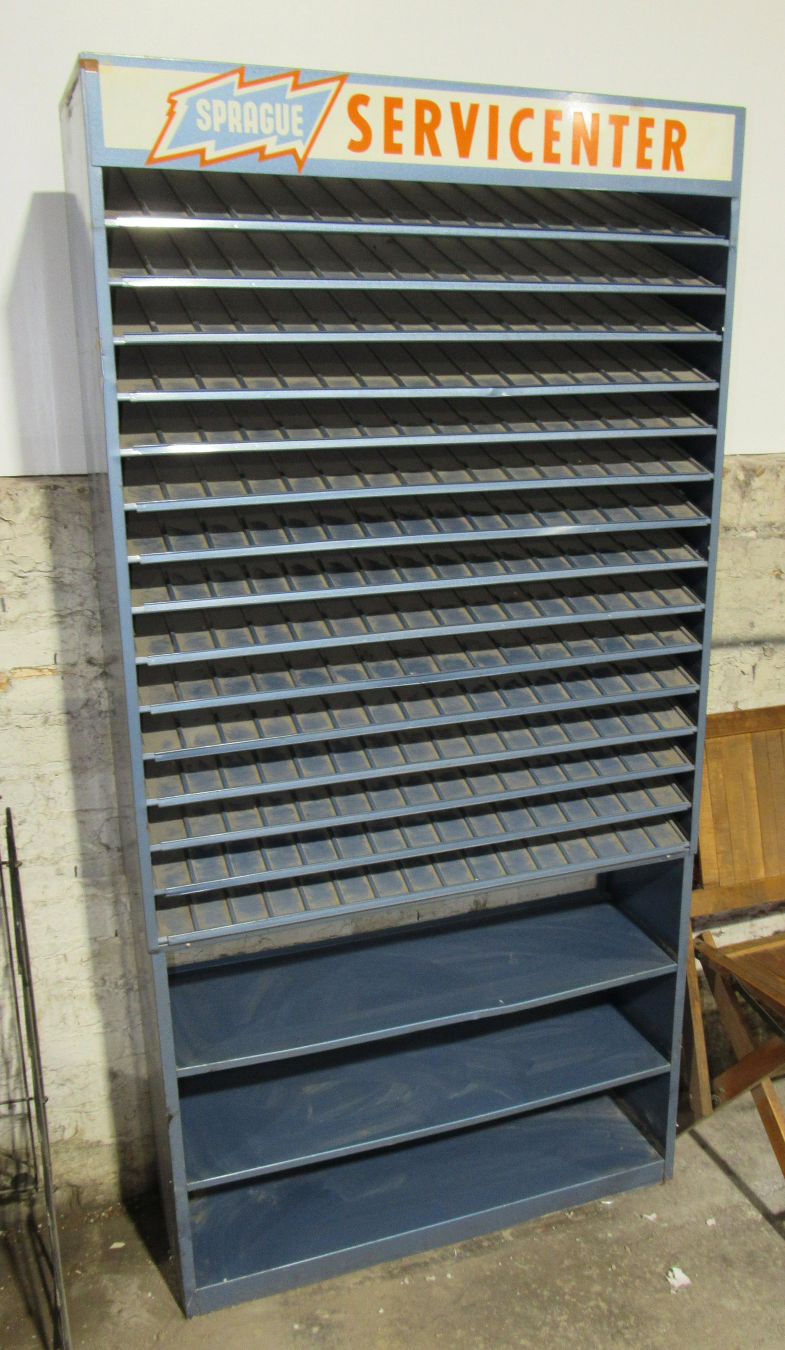 Sprague Service Center Metal Display Shelf: Sprague Service Center Metal Display Shelf. Dimensions: 67 x 34 x 10.5