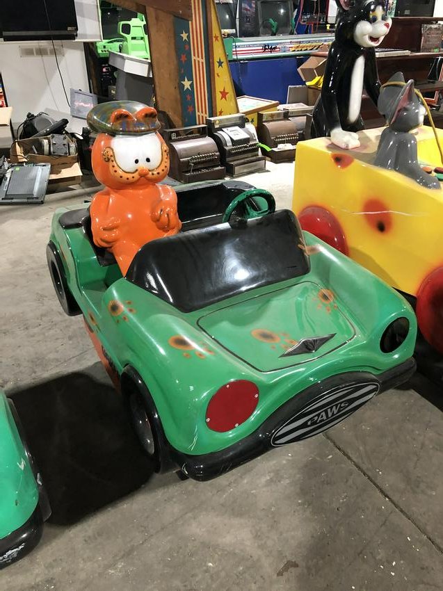 Garfield Car Coin Operated Kiddie Ride: Garfield Car Coin Operated Kiddie Ride, working. Dimensions: 44 x 31 x 52