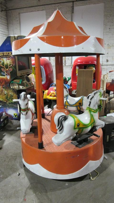 Horse Carousel Kiddie Ride: Horse Carousel Kiddie Ride, non-working. Dimensions: 83 x 51 x 51