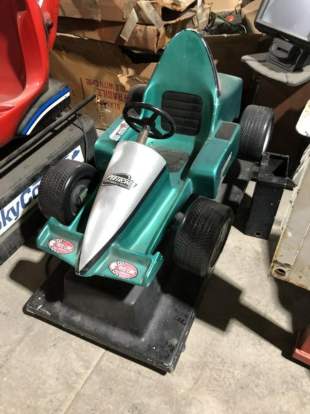 Teal Race Car Coin Operated Kiddie Ride: Teal Race Car Coin Operated Kiddie Ride. Working, runs on coin. Dimensions: 35 x 29 x 48