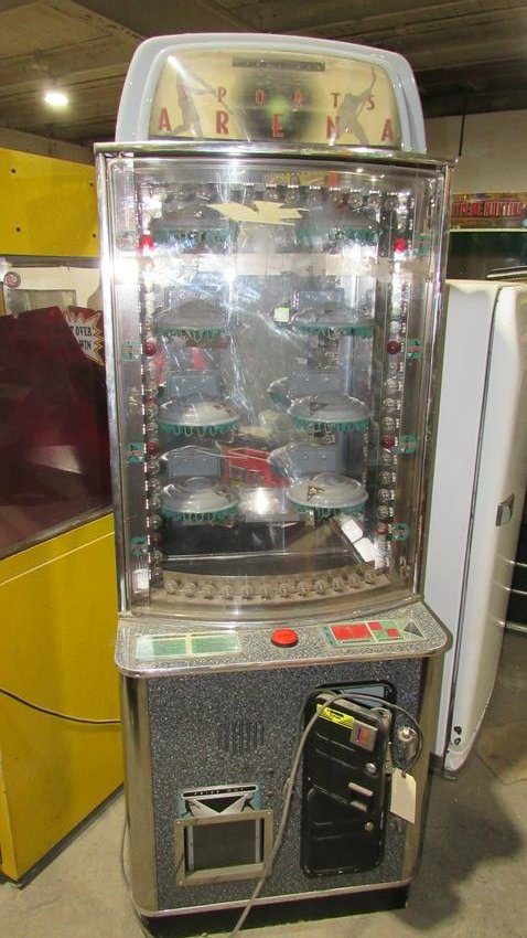 Sports Arena Prize Arcade Machine: Sports Arena Prize Arcade Machine, working. Dimensions: 77 x 28 x 30