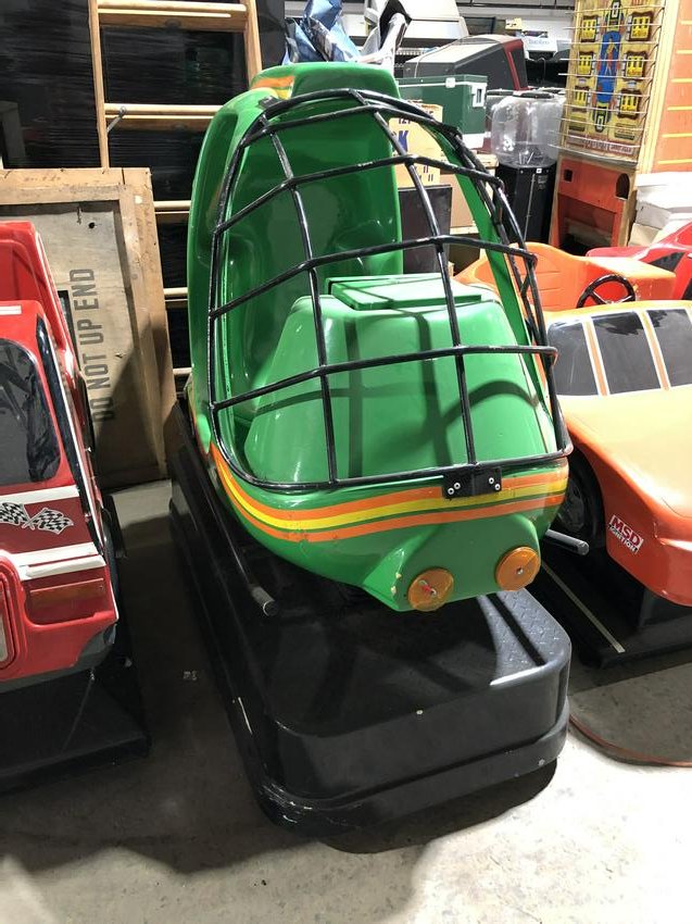 Green Helicopter Coin Operated Kiddie Ride: Green Helicopter Coin Operated Kiddie Ride, non-working. Dimensions: 55 x 29 x 62