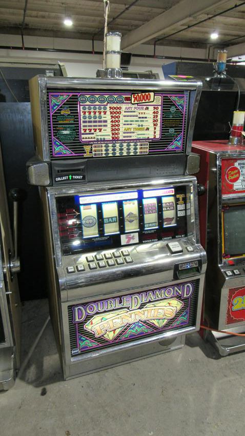 Double Diamond Pennies Slot Machine: Double Diamond Pennies Slot Machine. Complete, non-working. Ticket payout. Dimensions: 50 x 27 x 22