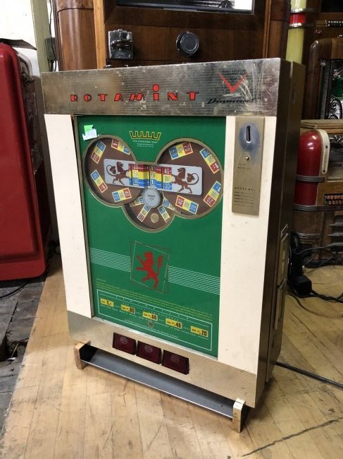 NSM RotaMint Wall Mounted Slot Machine: NSM RotaMint Wall Mounted Slot Machine, complete. Dimensions: 29 x 20 x 8