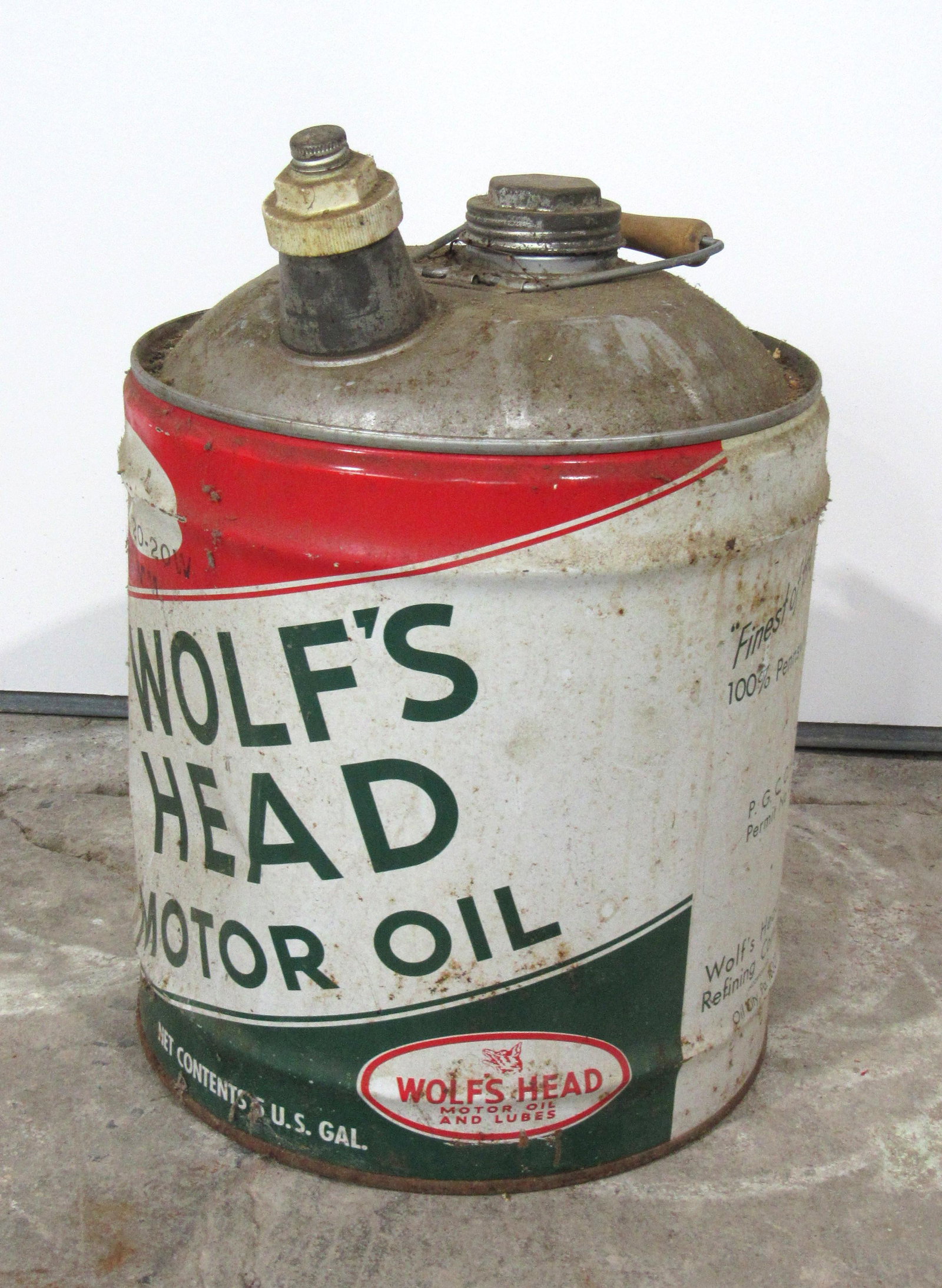 Wolf's Head Motor Oil Can: Wolf's Head Motor Oil Can. Dimensions: 16 x 12 x 12