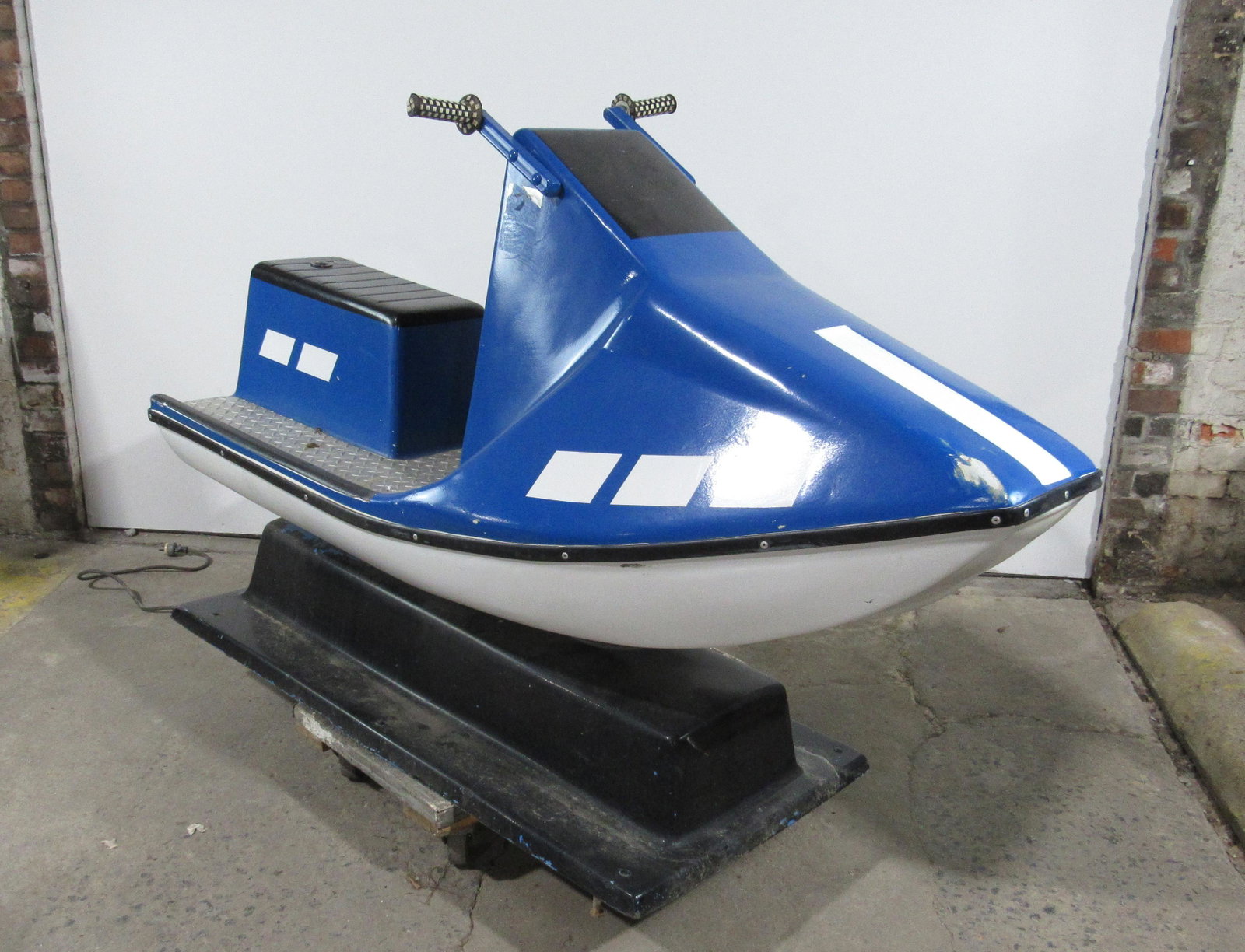 Blue Jet Ski Coin Operated Kiddie Ride: Blue Jet Ski Coin Operated Kiddie Ride, working with sound. This item requires third party shipping or pickup arrangements to be made. Dimensions: 47 x 28 x 69