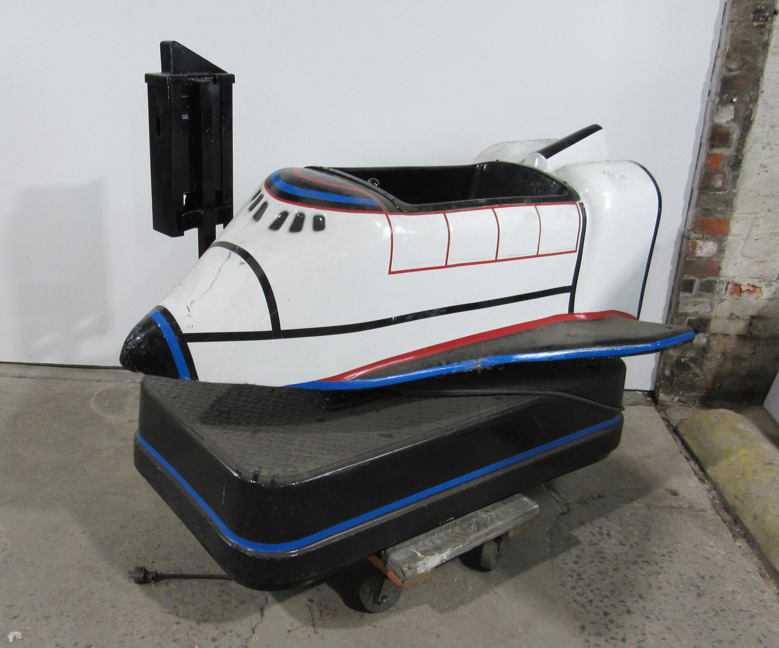 Space Shuttle Coin Operated Kiddie Ride: Space Shuttle Coin Operated Kiddie Ride, working with sound. This item requires third party shipping or pickup arrangements to be made. Dimensions: 33 x 60 x 45