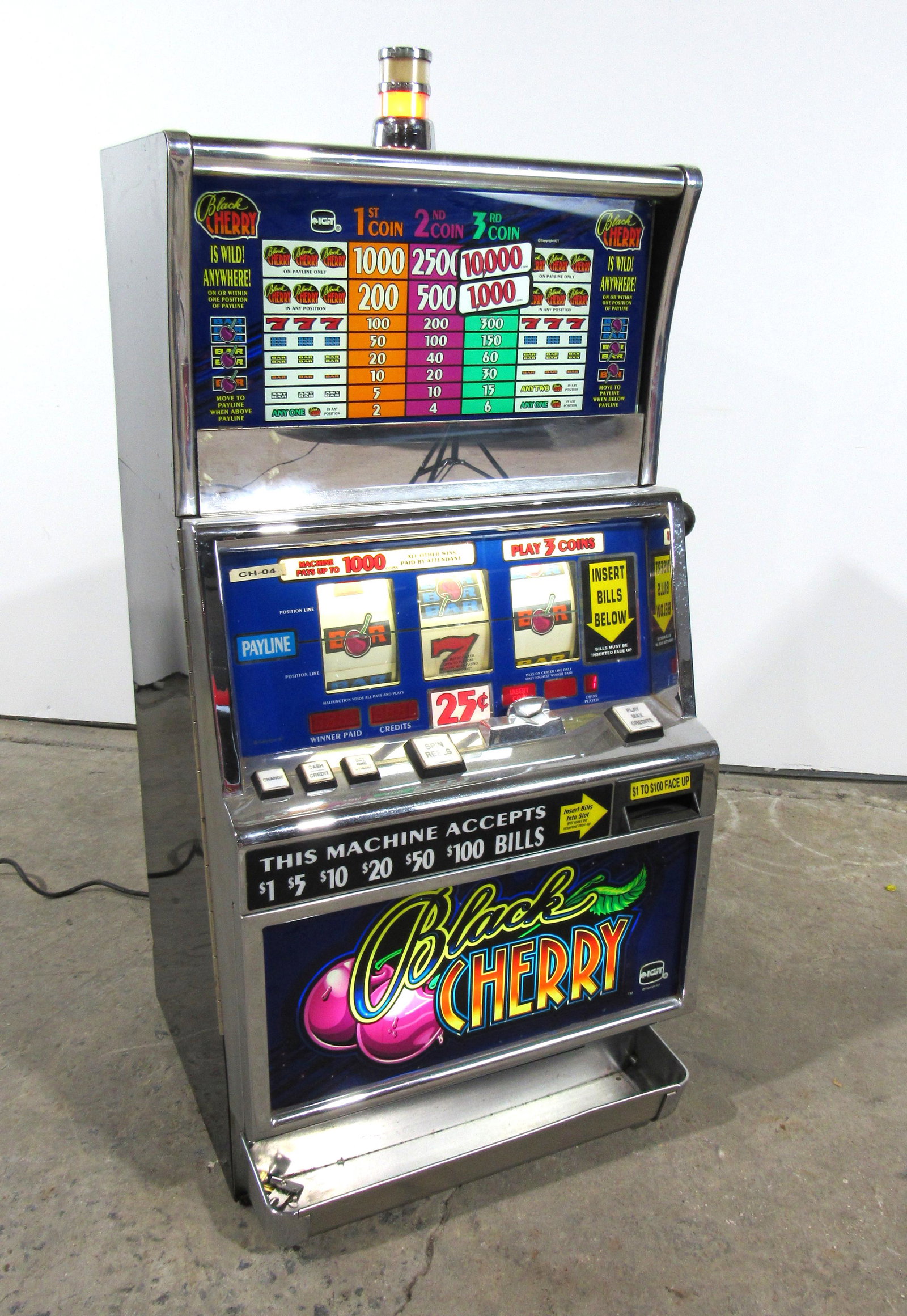 IGT Black Cherry Slot Machine: IGT Black Cherry Slot Machine, working. This item requires third party shipping or pickup arrangements to be made. Dimensions: 47 x 25 x 20