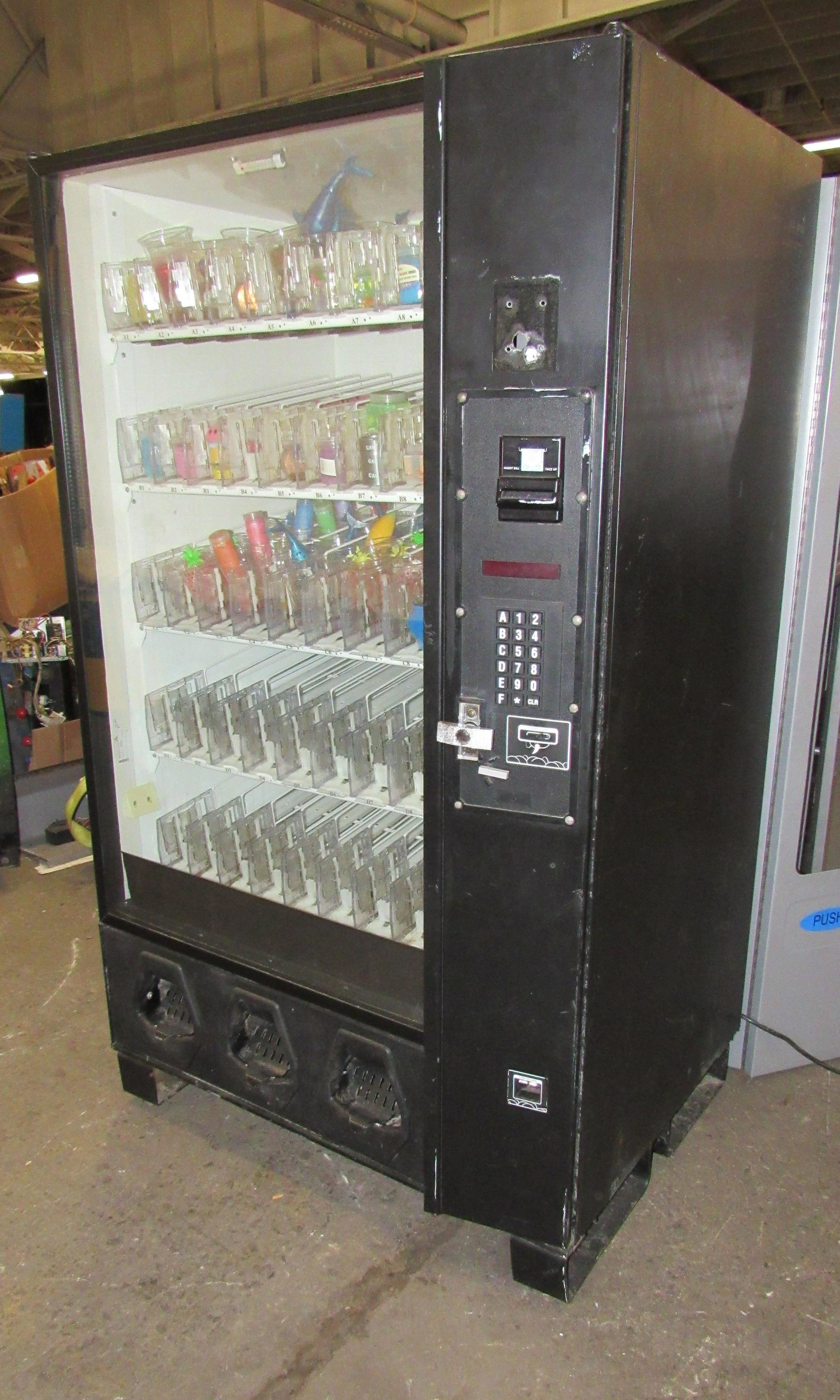 Snack / Toy Coin Operated Vending Machine: Snack / Toy Coin Operated Vending Machine. Just pulled off location. This item requires third party shipping or pickup arrangements to be made. Dimensions: 71 x 42 x 32