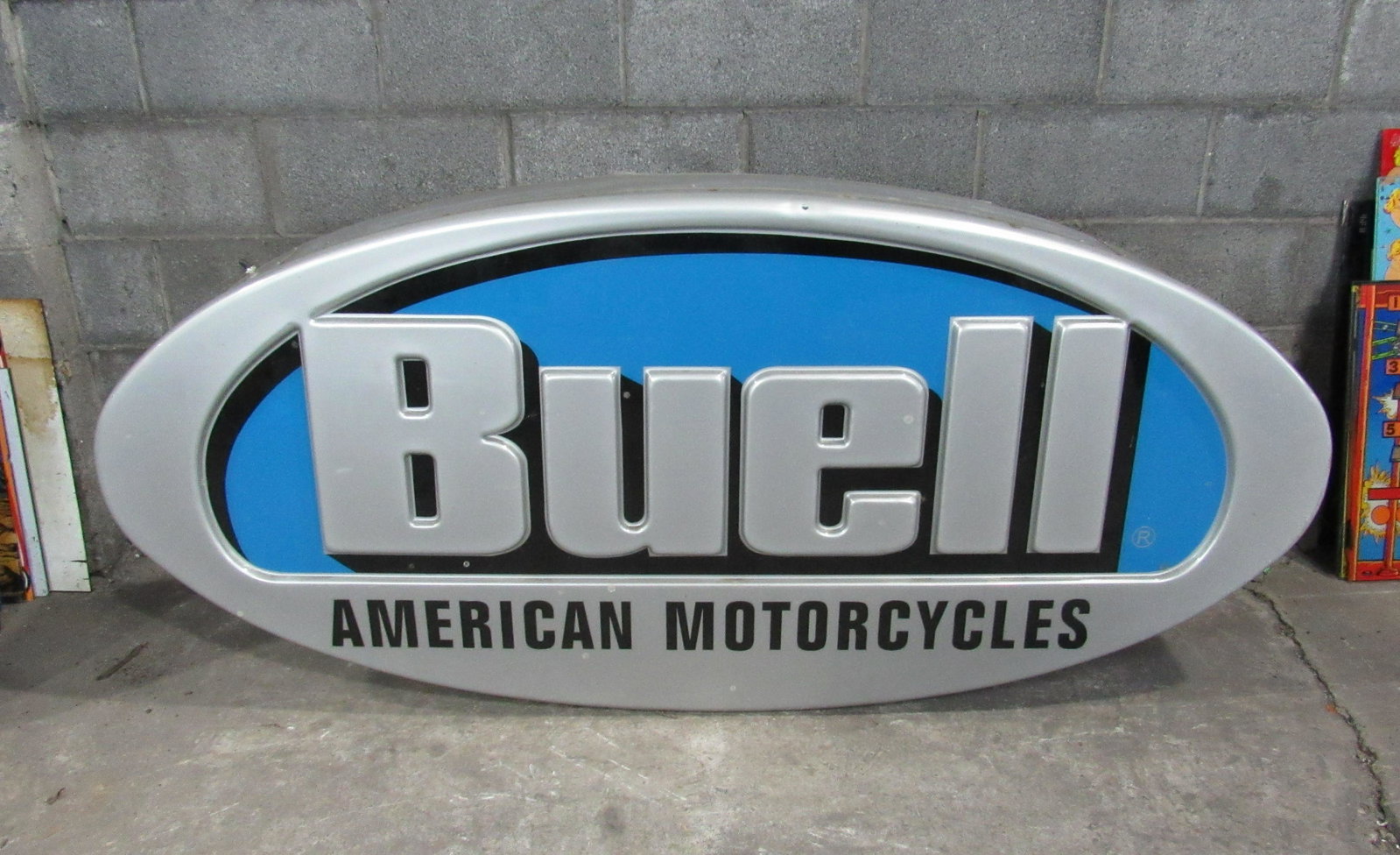 Buell American Motorcycles Advertising Oval Light Up: Buell American Motorcycles Advertising Oval Light Up Sign. From the first Dealership in the US. This item requires third party shipping or pickup arrangements to be made. Dimensions: 31 x 74 x 9