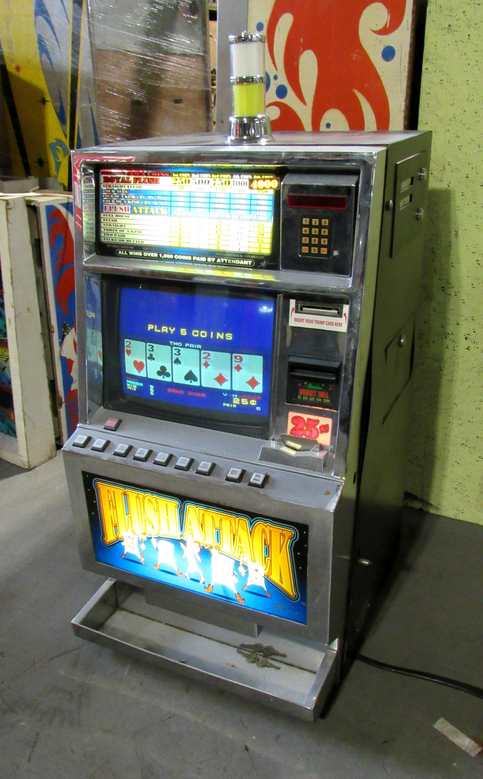 Flush Attack Coin Operated Slot Machine Arcade Game: Flush Attack Slot Machine, partially working. This item requires third party shipping or pickup arrangements to be made. Dimensions: 40 x 19 x 22