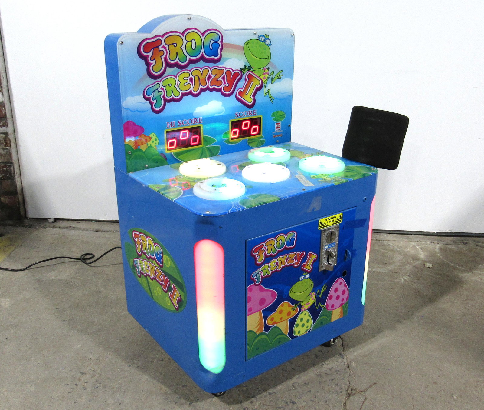 Frog Frenzy II Kids Arcade Game: Frog Frenzy II Kids Arcade Game, powers on, appears working. Lock not included. This item requires third party shipping or pickup arrangements to be made. Dimensions: 39x20x32