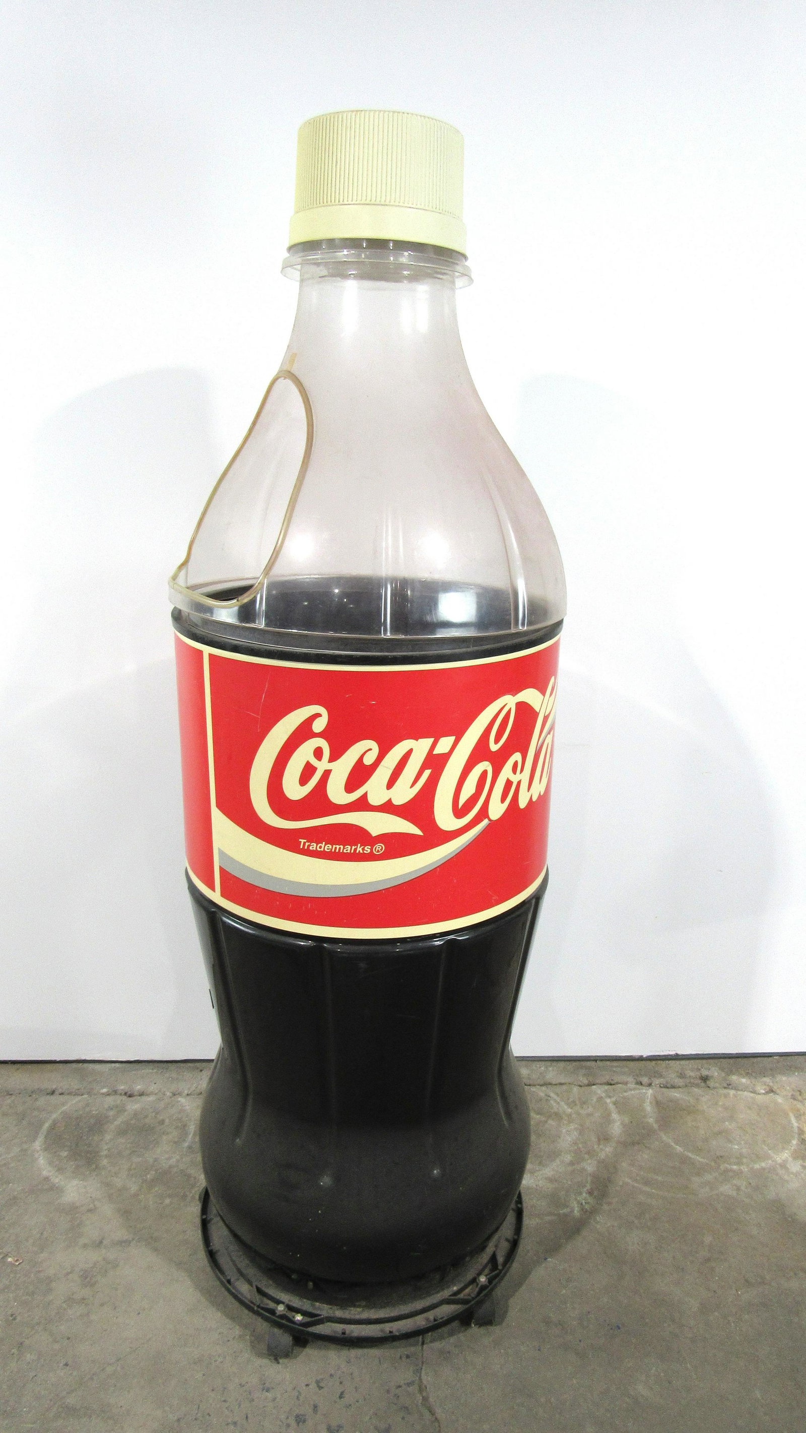 Oversized Coke Bottle Store Display: Oversized Coke Bottle Store Display. This item requires third party shipping or pickup arrangements to be made. Dimensions: 69 x 23 x 23