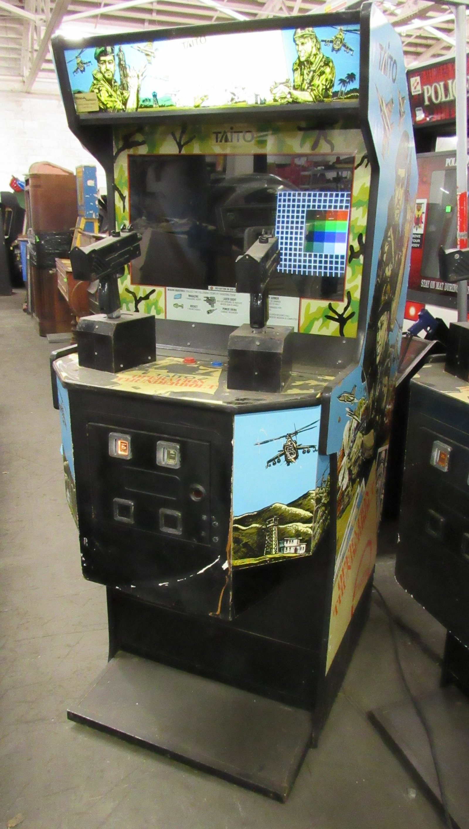 Taito Operation Thunderbolt Arcade Game: Taito Operation Thunderbolt Arcade Game, not working. This item requires third party shipping or pickup arrangements to be made. Dimensions: 73 x 29 x 41